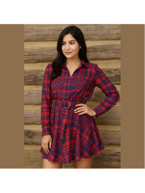 Asymmetrical dress features a bold red and blue plaid jacquard pattern. Small